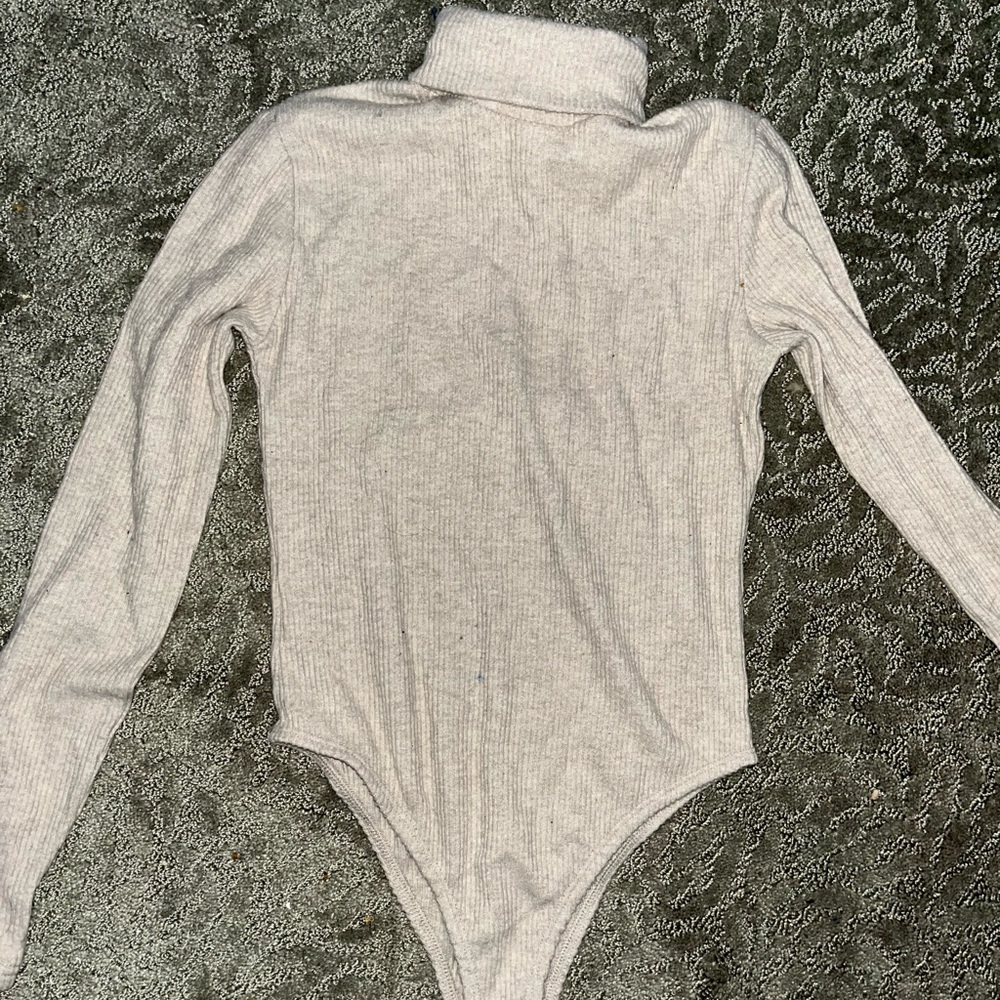 Large beige turtleneck bodysuit never worn
